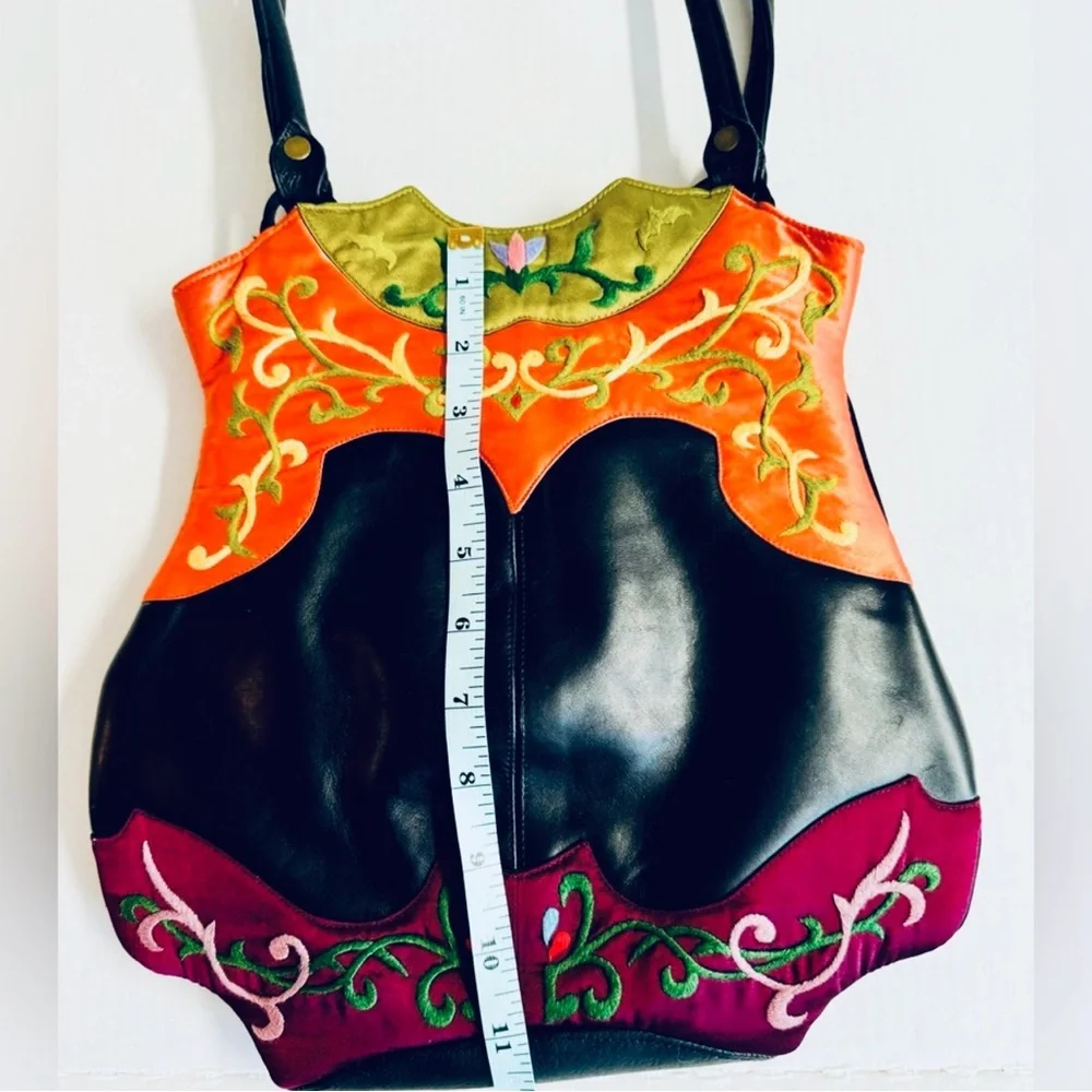 Vtg.Oovoo-Black shiny leather with orange+purple with hand embroidered silk.